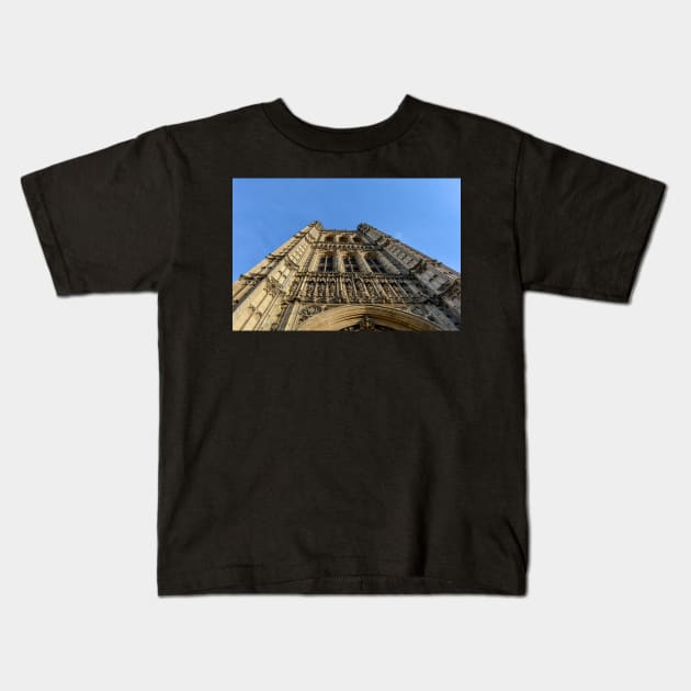 Victoria Tower against blue sky Kids T-Shirt by lena-maximova